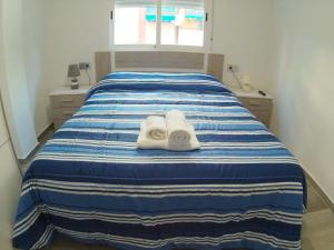 Postel nebo postele na pokoji v ubytování Apartamento Completo Plaza España