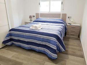 Postel nebo postele na pokoji v ubytování Apartamento Completo Plaza España