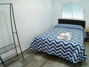 Postel nebo postele na pokoji v ubytování Apartamento Completo Plaza España