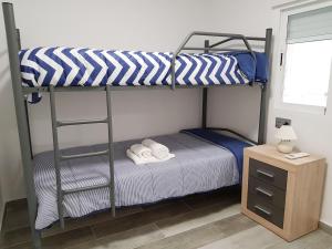 Postel nebo postele na pokoji v ubytování Apartamento Completo Plaza España