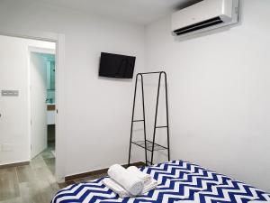 TV a/nebo společenská místnost v ubytování Apartamento Completo Plaza España