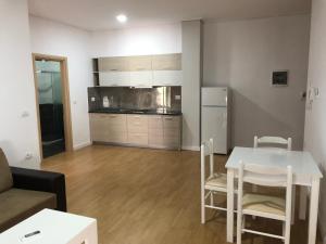 Kuchyň nebo kuchyňský kout v ubytování Franklin Rooms