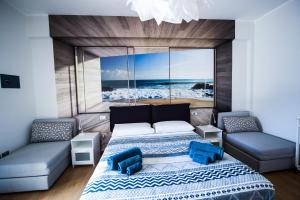 サレルノにあるVilla Carraraのベッドルーム1室(ベッド1台付)が備わります。