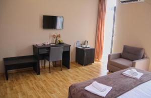 A bed or beds in a room at Rogalux Blue
