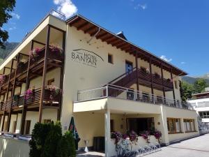 a building with flowers on the balconies at Banyan in Sankt Anton am Arlberg