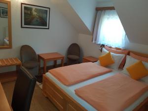 Posteľ alebo postele v izbe v ubytovaní Pansion Breza
