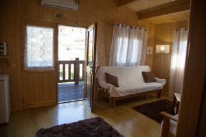 Ένα ή περισσότερα κρεβάτια σε δωμάτιο στο Quinta Da Fontinha
