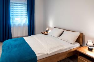 Ένα ή περισσότερα κρεβάτια σε δωμάτιο στο Apartament w Bizancjum 8 PARKING FREE 24H