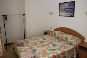 Postel nebo postele na pokoji v ubytování Hotel Radik