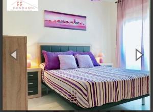 A bed or beds in a room at Como En Casa