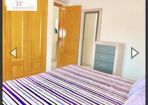 A bed or beds in a room at Como En Casa