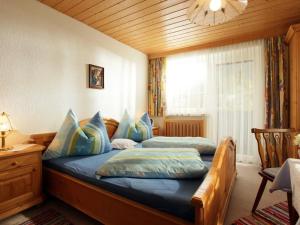 Ein Bett oder Betten in einem Zimmer der Unterkunft Haus Heckenrose