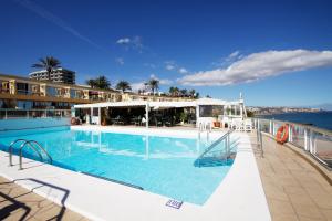 a large swimming pool on a cruise ship at Atlantic Beach Club in Playa del Ingles