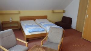 Postel nebo postele na pokoji v ubytování Chaty Kotárky