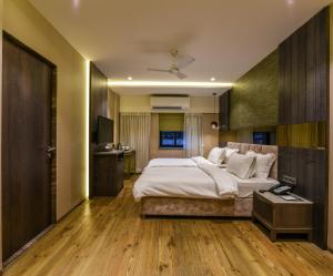 Postel nebo postele na pokoji v ubytování Hotel Orient Regency