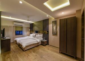 Postel nebo postele na pokoji v ubytování Hotel Orient Regency