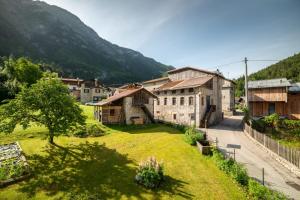 an aerial view of a village with a mountain at La Gerla Casa Vacanze Dolomiti in Perarolo di Cadore