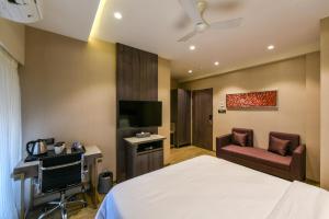 TV a/nebo společenská místnost v ubytování Hotel Orient Regency