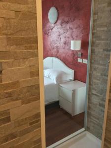 Koupelna v ubytování Hotel Malpensafiera + 37 fotografií