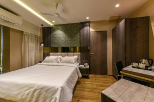 Postel nebo postele na pokoji v ubytování Hotel Orient Regency