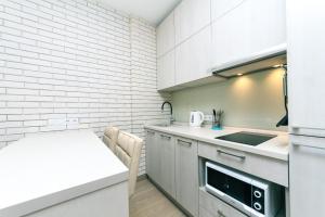 Kuchyňa alebo kuchynka v ubytovaní Comfort Town apartment