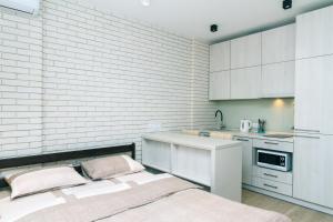 Kuchyňa alebo kuchynka v ubytovaní Comfort Town apartment + 3 fotografie