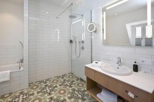 Ванная комната в Hotel Hirsch