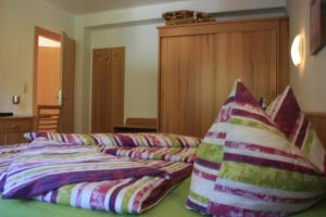 Postel nebo postele na pokoji v ubytování Haus Alpina
