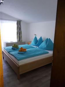 Łóżko lub łóżka w pokoju w obiekcie Appartement Wildkogelblick
