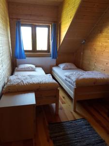 Postel nebo postele na pokoji v ubytování Cztery Pory Roku