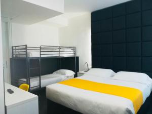 Postel nebo postele na pokoji v ubytování Hotel Pex Padova + 20 fotografií