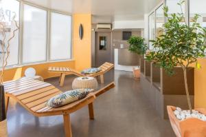 Résidence Hôtelière Natureva & Spa的休息区