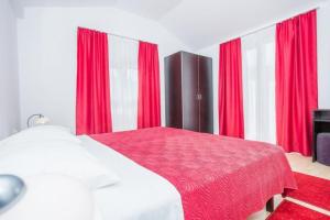 Postel nebo postele na pokoji v ubytování Apartments Macolic