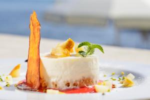 a piece of cake on a white plate at Villa delle Palme in Santa Marinella