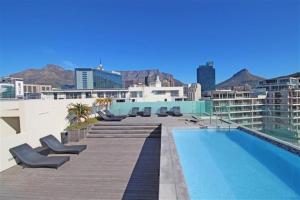 a swimming pool on the roof of a building at 214 Harbour Bridge in Cape Town