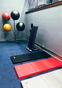 a bowling alley with a rack of pins and balls at Cumberland Hotel - OCEANA COLLECTION in Bournemouth