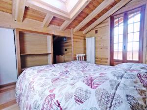 Krevet ili kreveti u jedinici u objektu Casa Vacanza in tipico Chalet di montagna