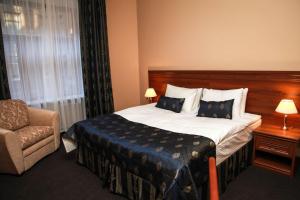 Una cama o camas en una habitación de Inn Na Pristanskoy
