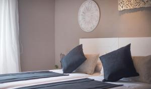 Ein Bett oder Betten in einem Zimmer der Unterkunft Circus House, TarracoHomes