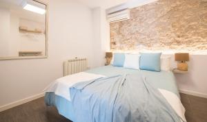 Ein Bett oder Betten in einem Zimmer der Unterkunft Circus House, TarracoHomes