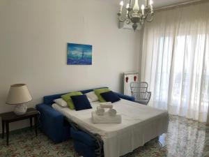A bed or beds in a room at Casa Carraturo