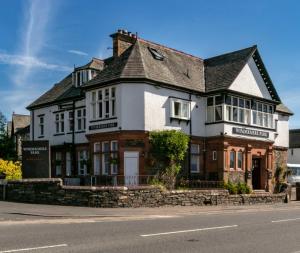 a house on the side of the street at Windermere Park B&B inc Free off-site Health Club in Windermere