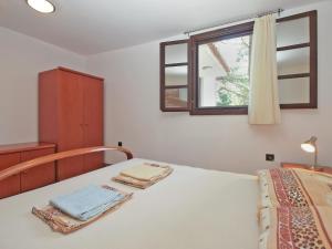 Posteľ alebo postele v izbe v ubytovaní Apartments Nenad 1720