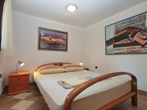 Posteľ alebo postele v izbe v ubytovaní Apartments Nenad 1720