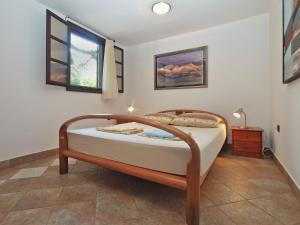 Posteľ alebo postele v izbe v ubytovaní Apartments Nenad 1720