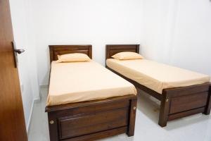 Postel nebo postele na pokoji v ubytování White Rose Hostel + 11 fotografií