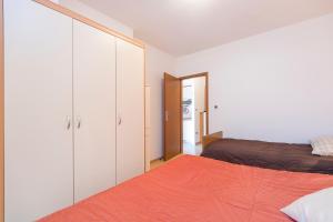 Postel nebo postele na pokoji v ubytování Apartment Ana