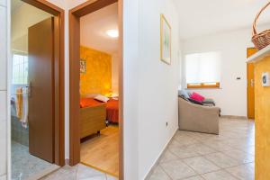 Postel nebo postele na pokoji v ubytování Apartment Ana