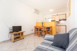 Kuchyň nebo kuchyňský kout v ubytování Apartment Ana
