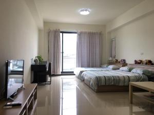 Taichung HSR Homestay TV 또는 엔터테인먼트 센터